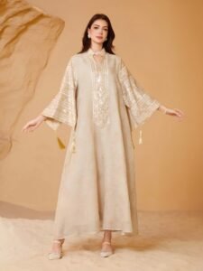 Close-up of custom embroidery and private label tag on a high-quality Nida fabric Abaya - Oharry-Your Trusted Custom Manufacturer for Middle Eastern Fashion Close-up of custom embroidery and private label tag on a high-quality Nida fabric Abaya